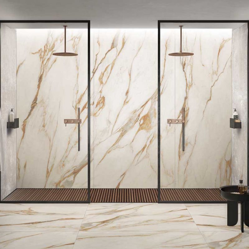 Pavimento in Gres Porcellanato Effetto Marmo Calacatta con Venature Oro Calde Lucido 120x120 - CS60009112